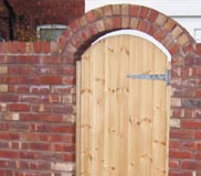Wall with arched doorway